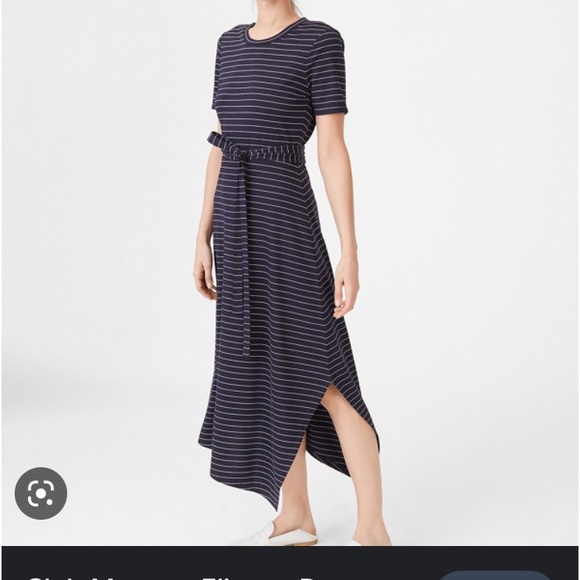 Short sleeve crew neck. Asymmetrical hem with slit at left side. - Picture 2 of 4